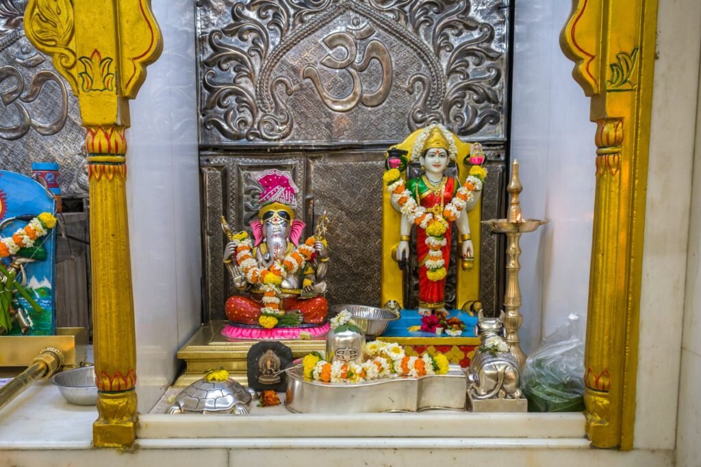 Business Astrology in Mumbai: Decorated Ganesh and Lakshmi idols for puja
