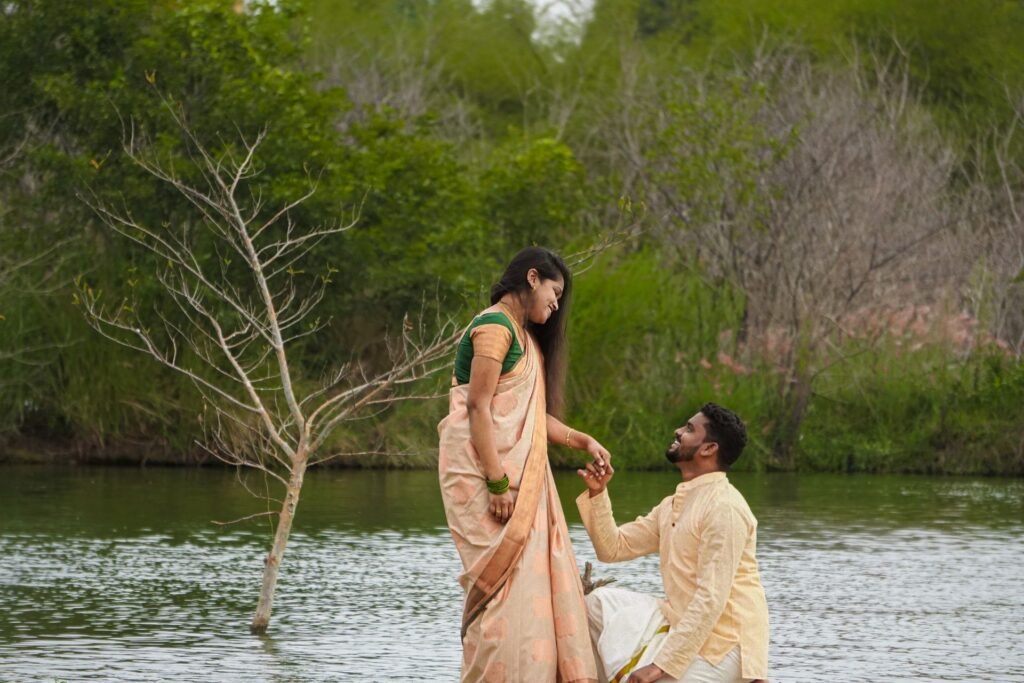 Love & Relationship Astrology in Mumbai: Proposal by a lake in traditional Indian clothes