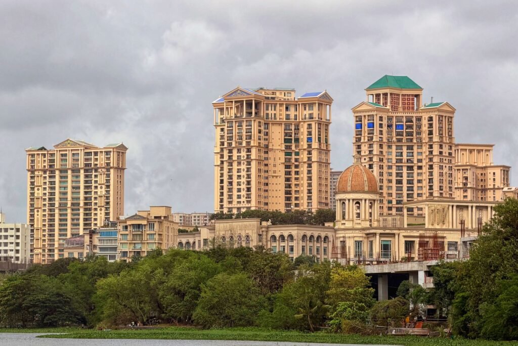 Astrologer in Thane: High-rise township towers above green trees